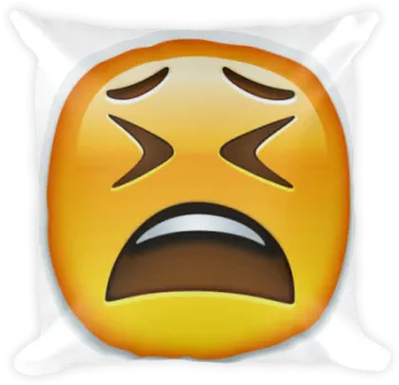 a pillow with a sad face on it