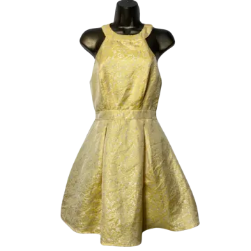 a yellow dress on a manne