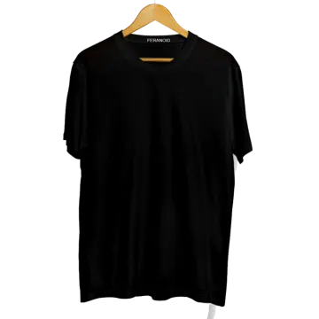 a black t - shirt hanging on a hanger