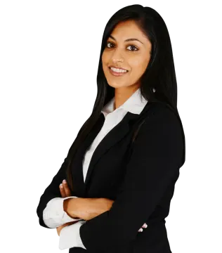 a woman standing with her arms crossed