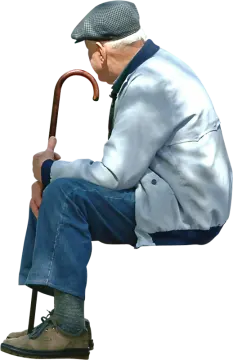 an old man sitting on a stool with a cane