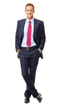a man in a blue suit and red tie