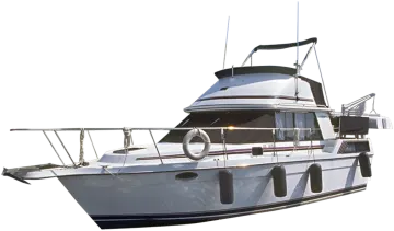 a white boat sitting on top of a dock