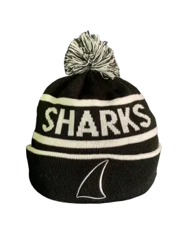 a black and white knit beanie hat with the word sharks on it