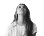 a woman in a white shirt and black pants