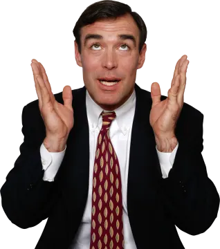 a man in a suit and tie holding his hands up