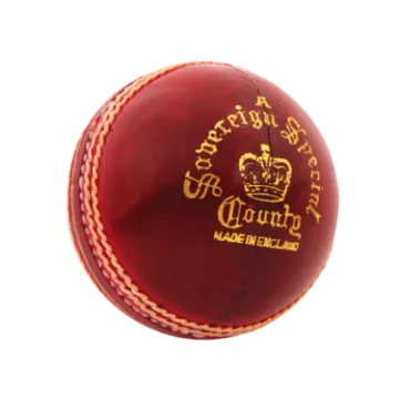 a red leather cricket ball on a white background