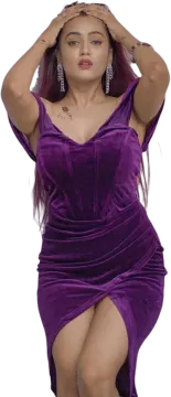 a woman wearing a purple velvet dress
