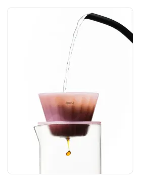 a liquid being poured into a beakle
