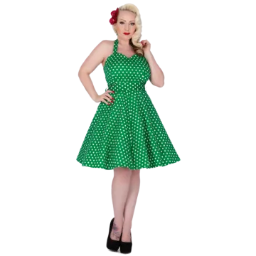 a woman in a green polka dress