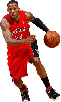 a man in a red jersey holding a basketball ball