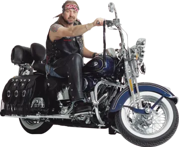 a man in leathers is sitting on a motorcycle