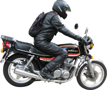 a man wearing a helmet on a motorcycle