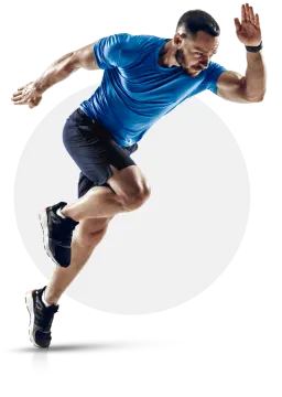 a man in a blue shirt and black shorts