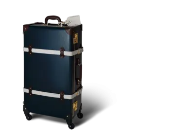 a black and white suitcase on wheels