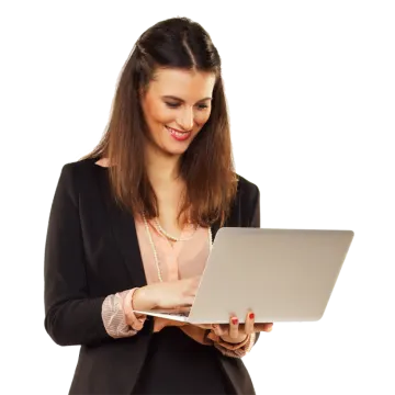 a woman in a business suit holding a laptop