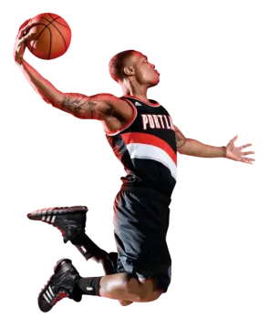 a basketball player jumping up in the air