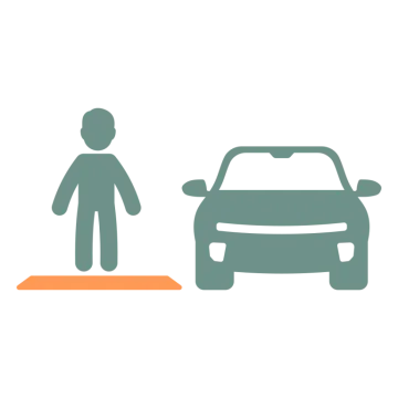 a person standing next to a car