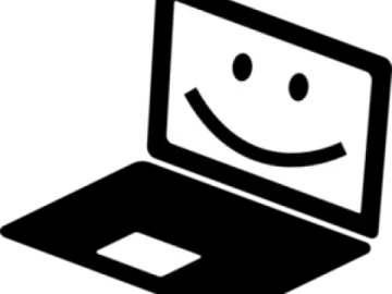 a laptop with a smiley face on it