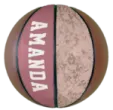 a pink and brown basketball ball