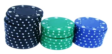 a stack of blue and green poker chips