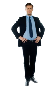 a man in a suit standing with his hands on his hips