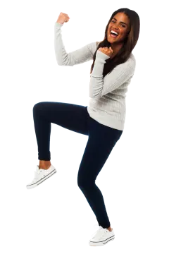 a woman is jumping in the air