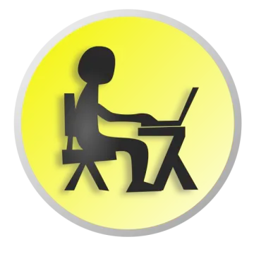 a person sitting at a desk in front of a yellow circle