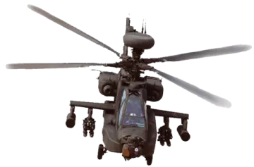 a military helicopter flying through the air