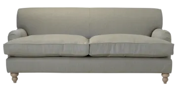 a grey couch with two pillows on it
