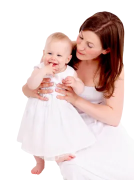 a woman holding a baby in her arms
