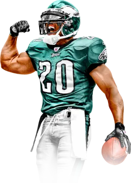 a man in a football uniform holding a ball