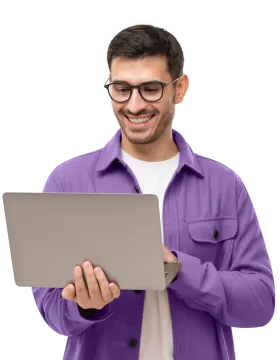 a man in a purple jacket holding a laptop