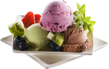 a plate with three scoops of ice cream and fruit