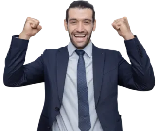 a man in a suit and tie with his fists raised