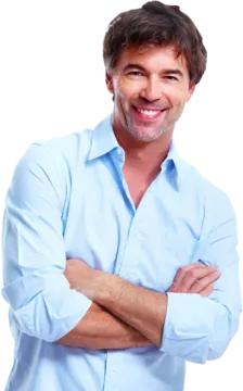 a smiling man with his arms crossed