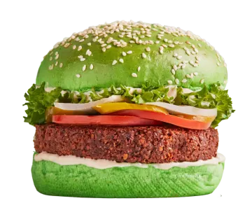 a large hamburger with meat and vegetables on it