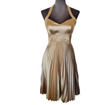 a brown and beige dress on a manne