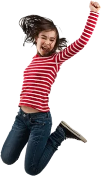 a young girl jumping in the air