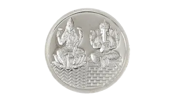 a silver coin with the image of buddhas on it