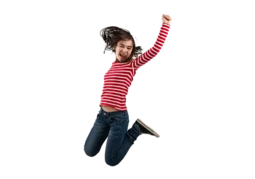 a young girl jumping in the air