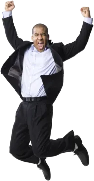 a man in a suit and tie jumping