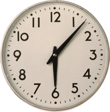 a close up of a clock on a white background