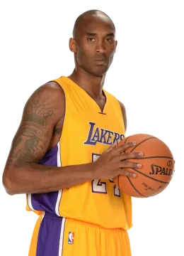 a man with tattoos holding a basketball ball