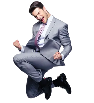 a man in a suit jumping up in the air