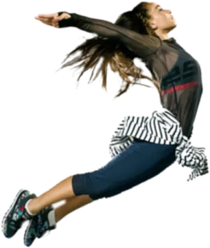 a young woman is jumping in the air