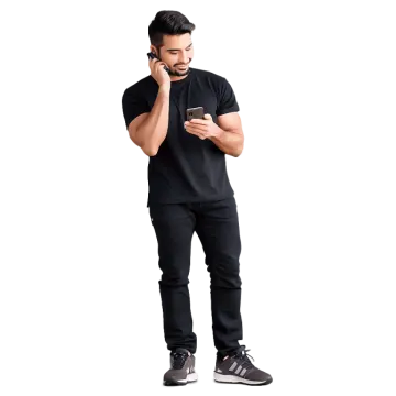 a man standing and talking on his cell phone