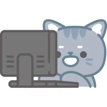 a cat sitting on top of a computer