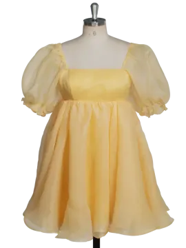 a yellow dress on a manne