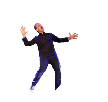 a man in a black suit is jumping